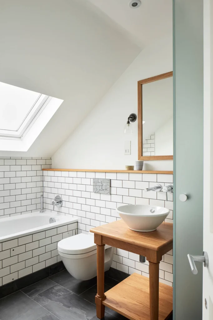 Bright lighting and clean design making a Small Bathroom Renovations feel spacious by Bathroom Renovations North Shore.